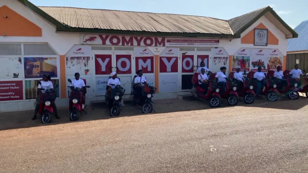 YomYom riders with their e-bikes outside our office
